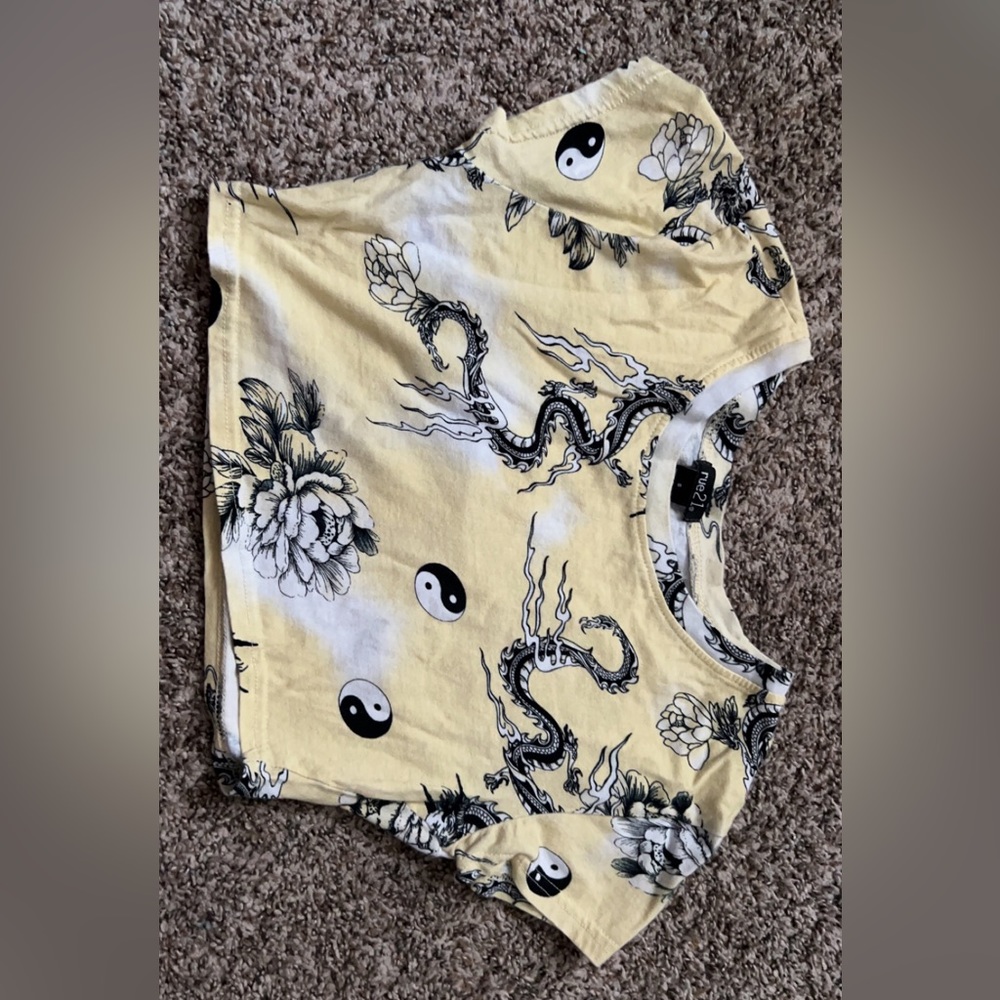 A beautifully designed baby crop top. It is a size small.